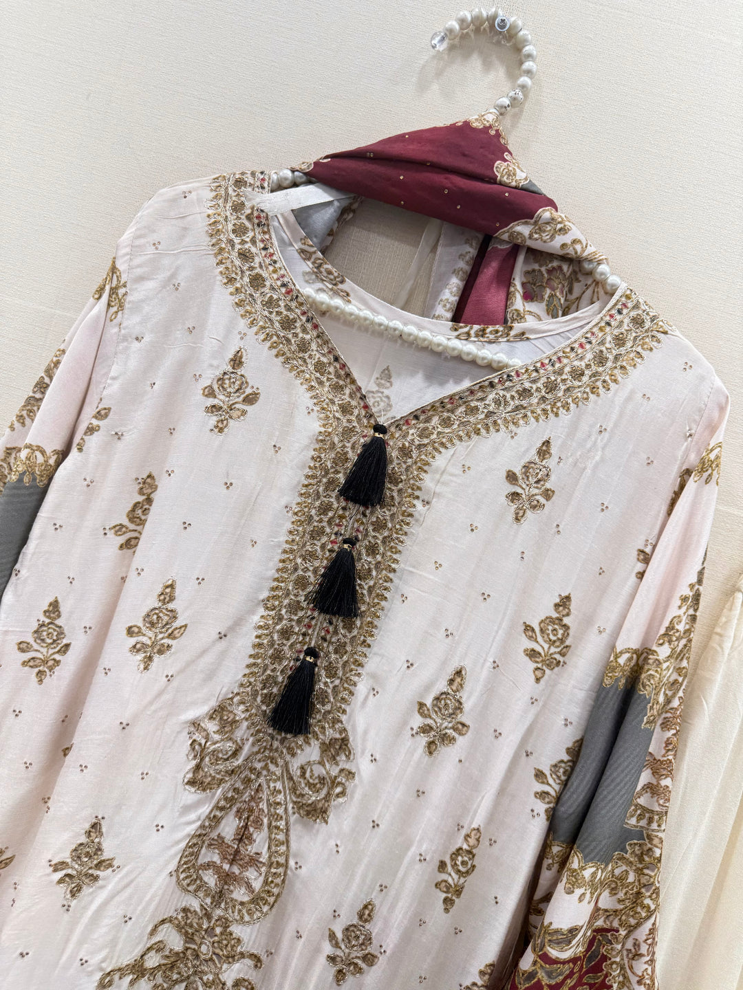 Muslin’s embroidered suits