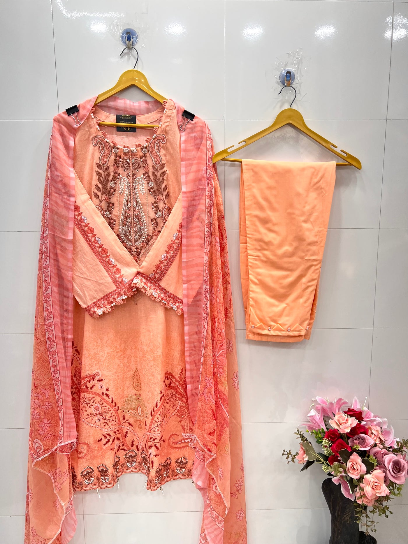 Pakistani pearl embellished suits 
2569