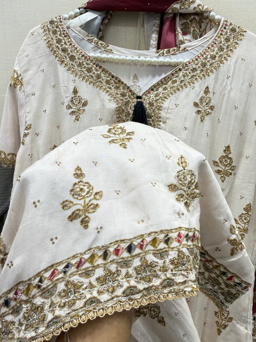 Muslin’s embroidered suits