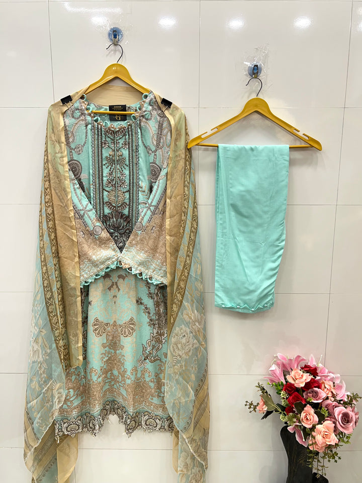 Pakistani pearl embellished suits 
2569