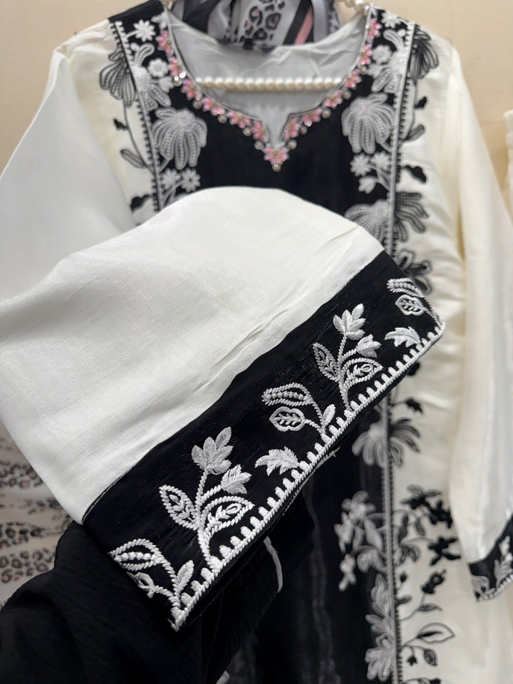 Embroidered pakistani suits