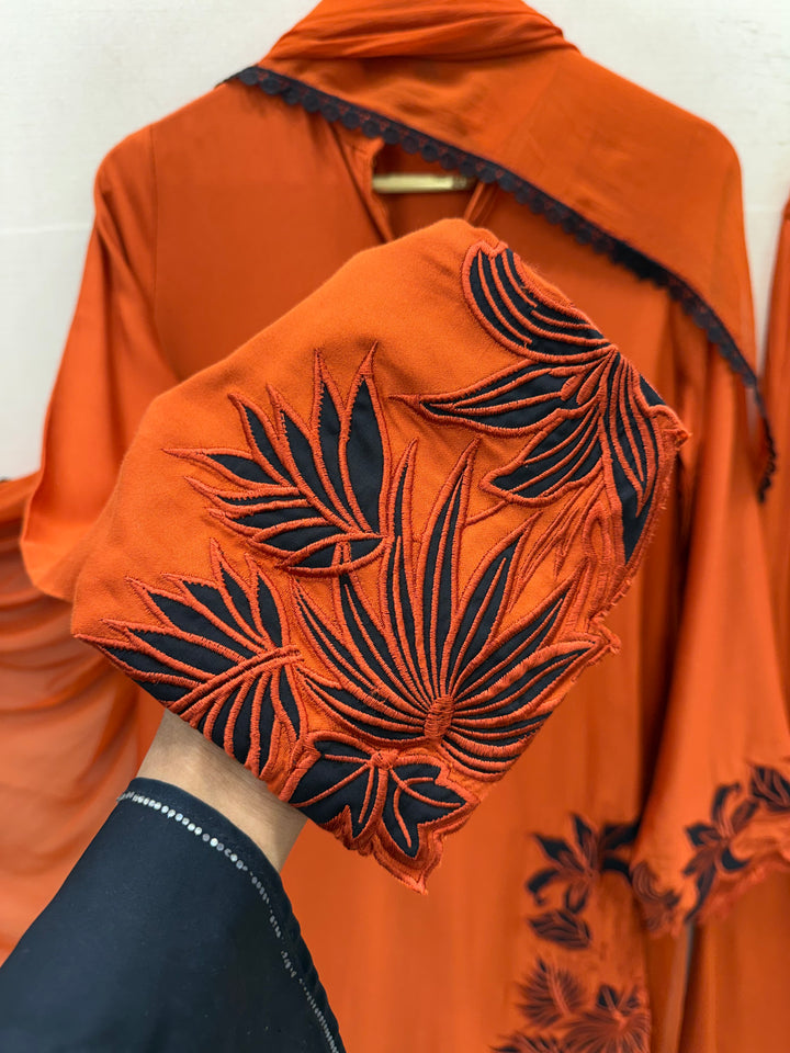 Cutwork embroidered suits