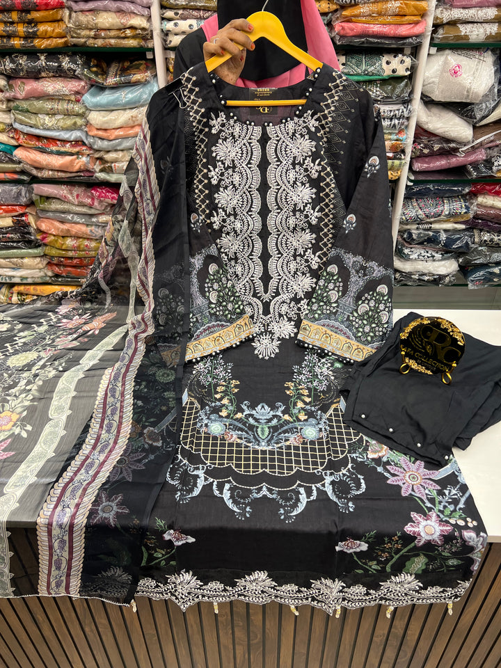 Pakistani pearl embellished suits 
2569