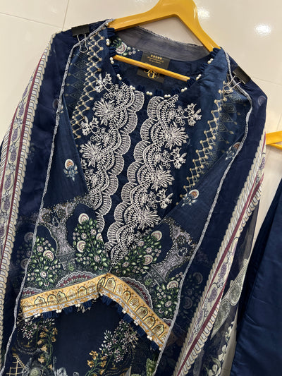 Pakistani pearl embellished suits 
2569