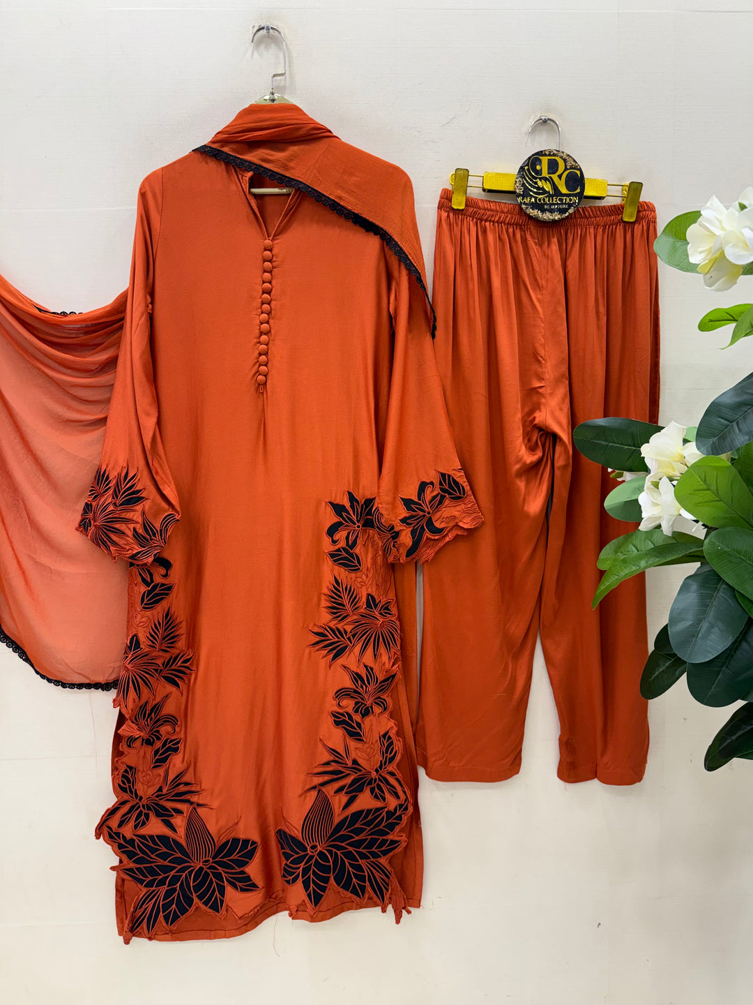 Cutwork embroidered suits