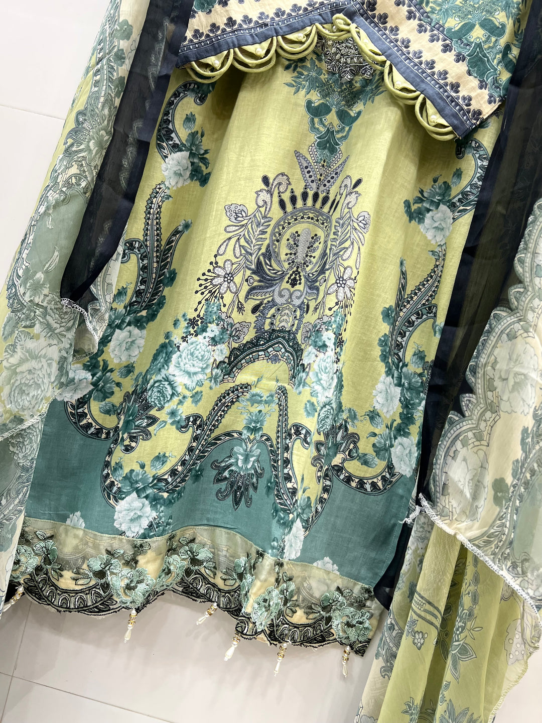 Pakistani pearl embellished suits 
2569