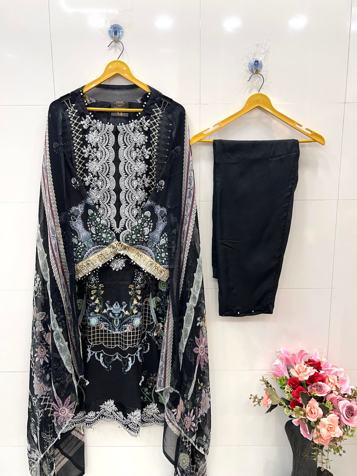 Pakistani pearl embellished suits 
2569