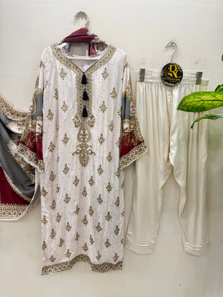 Muslin’s embroidered suits