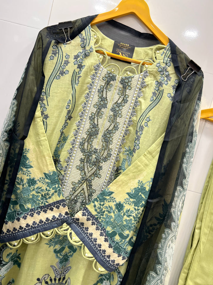 Pakistani pearl embellished suits 
2569