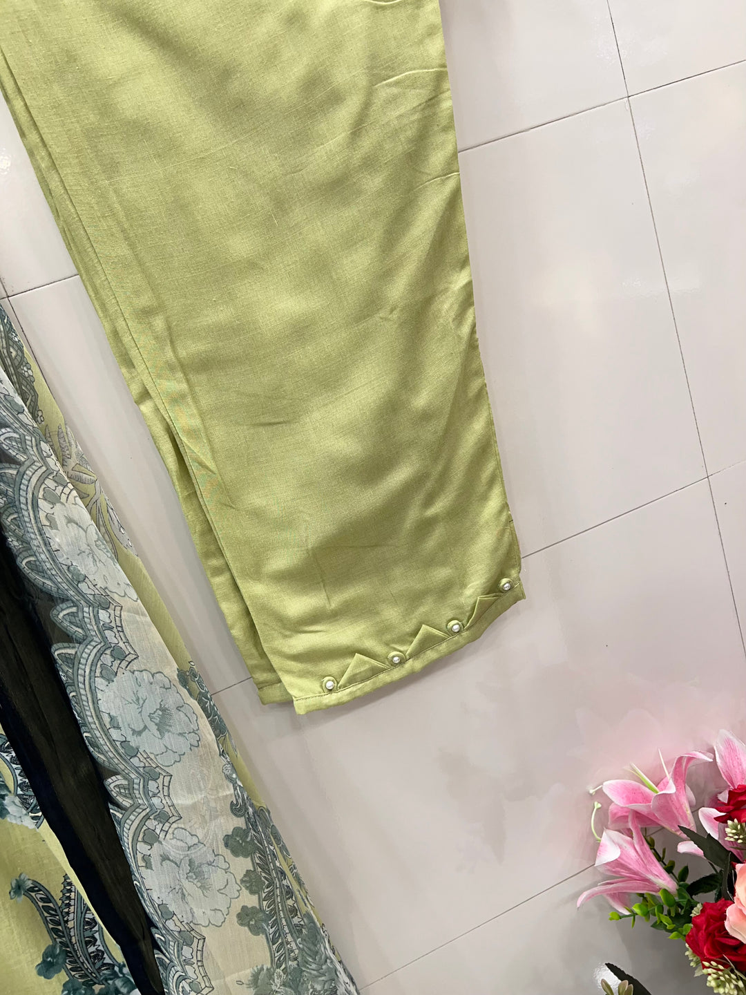 Pakistani pearl embellished suits 
2569