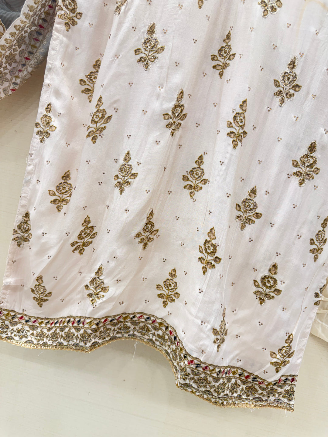 Muslin’s embroidered suits